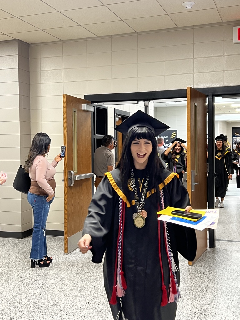 Image showing 🎓 One Last Walk, A Lifetime of Memories: The Class of 2026 Hall Walk 🎓  Today, Friday, May 15, 2026, the hallways of Evans County Schools were filled with a special kind of magic. Our seniors donned their graduation regalia and took their final walk through the schools that helped shape them into the young men and women they are today.  As they marched through the halls, they weren't just walking for themselves—they were walking for the elementary students who gave them high-fives and the middle schoolers who looked up with wide eyes. This tradition serves as a powerful reminder of what hard work and perseverance look like.  Why the Hall Walk matters:  Inspiring the Next Generation: Younger Tigers get to see exactly what their goal is.  A "Thank You" to Teachers: It’s a chance for former teachers to see how much their "little ones" have grown.  The Final Countdown: Tomorrow, these same students will cross Veterans Memorial Field as graduates!  Congratulations to the Class of 2026. You’ve left your mark on these halls, and we can’t wait to see you lead the way tomorrow! 🐯🖤💛  #TheDEN #ClassOf2026 #SeniorHallWalk #TigerLegacy #FullCircle #GraduationEve