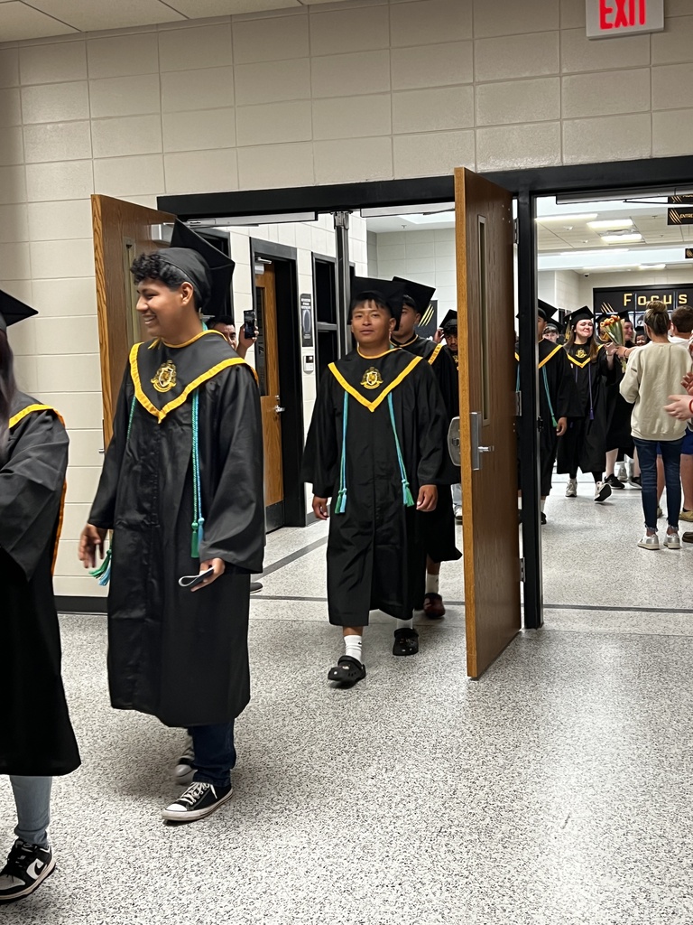 Image showing 🎓 One Last Walk, A Lifetime of Memories: The Class of 2026 Hall Walk 🎓  Today, Friday, May 15, 2026, the hallways of Evans County Schools were filled with a special kind of magic. Our seniors donned their graduation regalia and took their final walk through the schools that helped shape them into the young men and women they are today.  As they marched through the halls, they weren't just walking for themselves—they were walking for the elementary students who gave them high-fives and the middle schoolers who looked up with wide eyes. This tradition serves as a powerful reminder of what hard work and perseverance look like.  Why the Hall Walk matters:  Inspiring the Next Generation: Younger Tigers get to see exactly what their goal is.  A "Thank You" to Teachers: It’s a chance for former teachers to see how much their "little ones" have grown.  The Final Countdown: Tomorrow, these same students will cross Veterans Memorial Field as graduates!  Congratulations to the Class of 2026. You’ve left your mark on these halls, and we can’t wait to see you lead the way tomorrow! 🐯🖤💛  #TheDEN #ClassOf2026 #SeniorHallWalk #TigerLegacy #FullCircle #GraduationEve