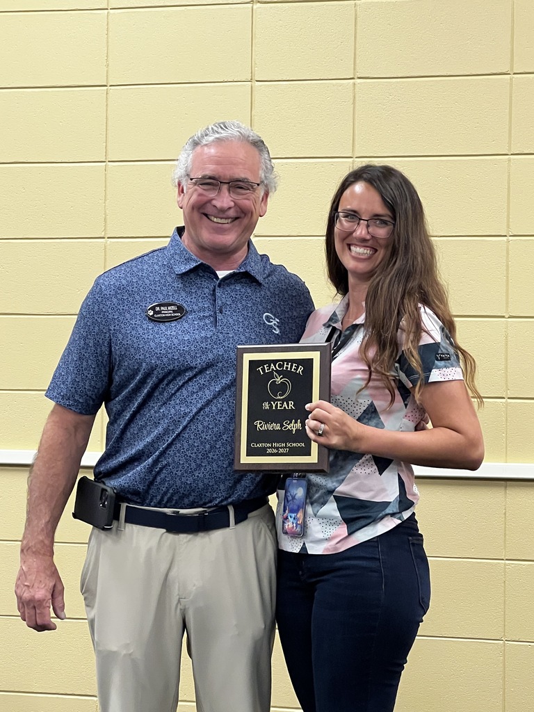 Image showing 🏆 Announcing the CHS 2026-2027 Teacher of the Year: Ms. Riviera Selph! 🐯 Let’s hear a massive roar for one of the absolute best in the business! We are thrilled to officially congratulate Ms. Riviera Selph on being named Claxton High School’s Teacher of the Year!  Ms. Selph has been a cornerstone of our math department for years, bringing passion, patience, and a high level of expertise to the hallways of CHS.  Why we are so proud to celebrate Ms. Selph:  Mastery of the Craft: She has worked tirelessly over the years to hone her skills, becoming an exceptional educator across a wide variety of mathematics courses.  Versatility in the Classroom: Whether breaking down foundational equations or guiding students through advanced math concepts, she makes learning accessible for every Tiger.  Unmatched Dedication: Her commitment to the success of our students, faculty, and staff makes CHS a better place every single day.  (This well-deserved honor comes right on the heels of her being named the 2026 STAR Teacher by Hannah Hendrix—it is safe to say it has been an incredible year of recognition for her!)  Thank you, Ms. Selph, for your hard work, your late hours, and your unwavering dedication to our school community. We appreciate you! 🖤💛  #TeacherOfTheYear #MathMagic #ClaxtonHigh #TigerPride #EvansCountySchools