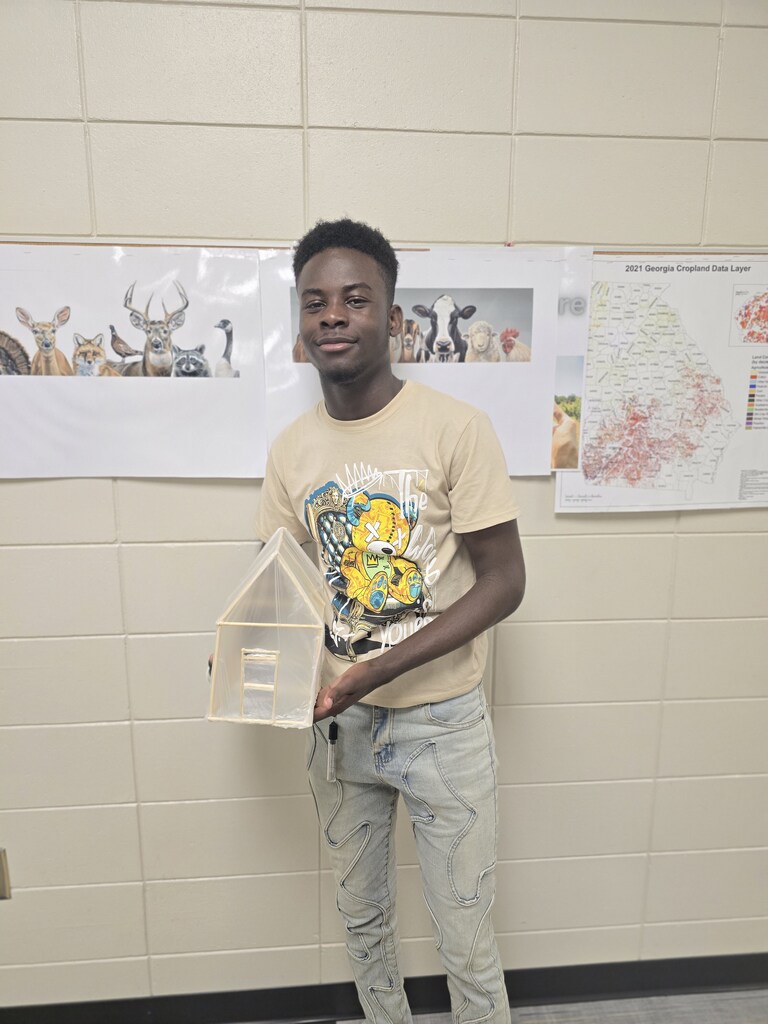 Image showing 🌿 Are you working in your greenhouse or garden this summer? How is it going? 🍅  Today we are throwing it back to a great hands-on project from our General Horticulture classes that has us feeling inspired to test our green thumbs this June! 🔨  Before break started, students moved beyond the textbook to design and build their own mini greenhouses. They had to apply structural concepts to real-world models, focusing on critical factors like light transmission, ventilation, and structural integrity.  If you're gardening this summer, we hope you're seeing lots of success and enjoying all those summer favorites!🌱  #FlashbackFriday #CTAE #Horticulture #AgScience #LearningByDoing #SummerGardening