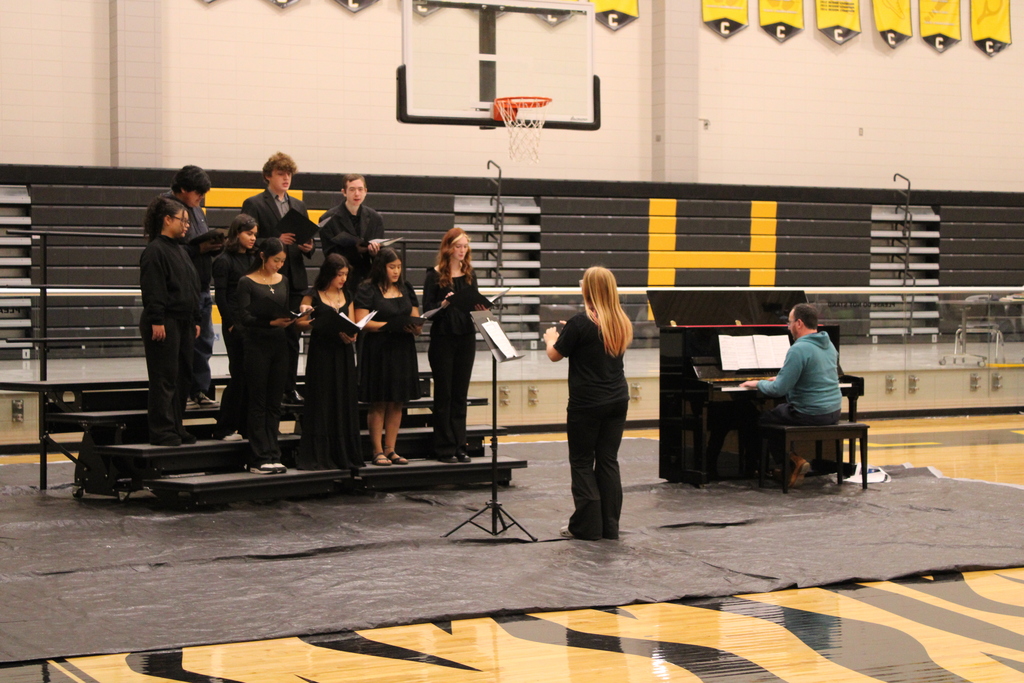 Image showing 🎶 What songs are playing in the background as you make memories this summer? 🎸  For this #FlashbackFriday, we are throwing it back to the beautiful music and incredible creativity of our Band and Chorus performances!  It takes a lot of practice, courage, and dedication to perform, and our students absolutely blew us away with their talents throughout the year.  🎶  #FlashbackFriday #FineArts #TigerBand #TigerChorus #SummerPlaylists 