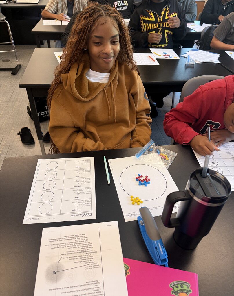 Image showing Making chemistry a little sweeter in Tiger Country! 🍬⚛️  Miss McGrath’s Chemistry students put a delicious spin on science by using M&M’s to model protons, neutrons, and electrons! 🔴🟡🔵 Students got hands-on practice identifying subatomic particles and building atomic structures for different elements.  Working together, exploring science, and building knowledge with one shared purpose! 🐅🖤💛  Once a Tiger, always a Tiger!  #OneRoar #ClaxtonTigers #CHSChemistry #HandsOnScience #STEMatCHS #OnceATigerAlwaysATiger #ClaxtonGA #TigerPride