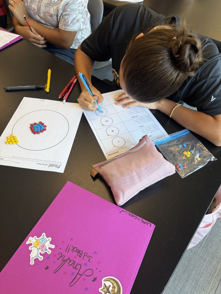 Image showing Making chemistry a little sweeter in Tiger Country! 🍬⚛️ Miss McGrath’s Chemistry students put a delicious spin on science by using M&M’s to model protons, neutrons, and electrons! 🔴🟡🔵 Students got hands-on practice identifying subatomic particles and building atomic structures for different elements. Working together, exploring science, and building knowledge with one shared purpose! 🐅🖤💛 Once a Tiger, always a Tiger! #OneRoar #ClaxtonTigers #CHSChemistry #HandsOnScience #STEMatCHS #OnceATigerAlwaysATiger #ClaxtonGA #TigerPride