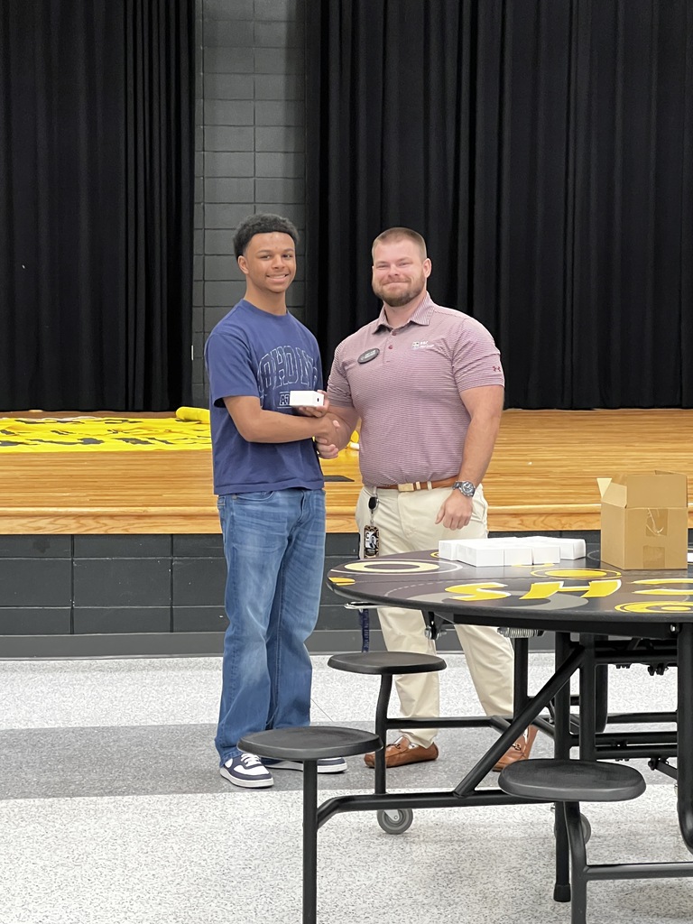 Image showing 💍✨ A BIG DAY FOR THE CLASS OF 2028! 🐅🖤💛  On Wednesday, August 27th, our Class of 2028 marked a major high school milestone as they officially received their class rings!  Representatives from The Roderick Group (an affiliate of Herff Jones) stopped by to deliver these timeless symbols of achievement—along with some delicious Chick-fil-A! 🐔🥤 They spent time sharing the rich history of class rings and guiding students on the tradition of how to wear them properly.  CHS Principal Mr. Rowe officially presented our Tigers with their rings, and then it was time to put them on display! 💎📸  Wearing their school pride on their hands, our juniors are moving forward together with one purpose—building memories that will last a lifetime under One Roar! ⚡  Once a Tiger, always a Tiger! 🐅🐾  #OneRoar #ClaxtonTigers #ClassOf2028 #HerffJones #ClassRings #TigerPride #OnceATigerAlwaysATiger #ClaxtonGA #CHSTigers