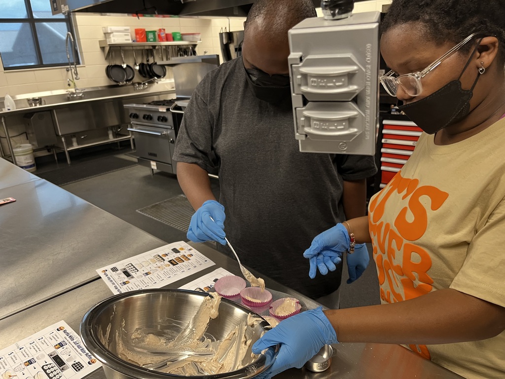 Image showing 🧁 BAKING UP SUCCESS IN DR. ROBINSON’S CLASS! 🐅🖤💛 Students in Dr. Robinson’s class have been busy building essential life and social skills through a tasty hands-on project! 👩🍳👨🍳 Our Tigers practiced reading and following a recipe step-by-step as they worked together to mix and bake homemade muffins. 🥣✨ Along the way, they put key communication skills into action by sharing materials, taking turns, and supporting one another as a team. And the best part? Enjoying the delicious results of their hard work! 😋🧁 Learning together, communicating together, and growing together with one shared purpose under One Roar! ⚡ Once a Tiger, always a Tiger! 🐅🐾 #OneRoar #ClaxtonTigers #LifeSkills #HandsOnLearning #TigerPride #OnceATigerAlwaysATiger #ClaxtonGA #CHSTigers
