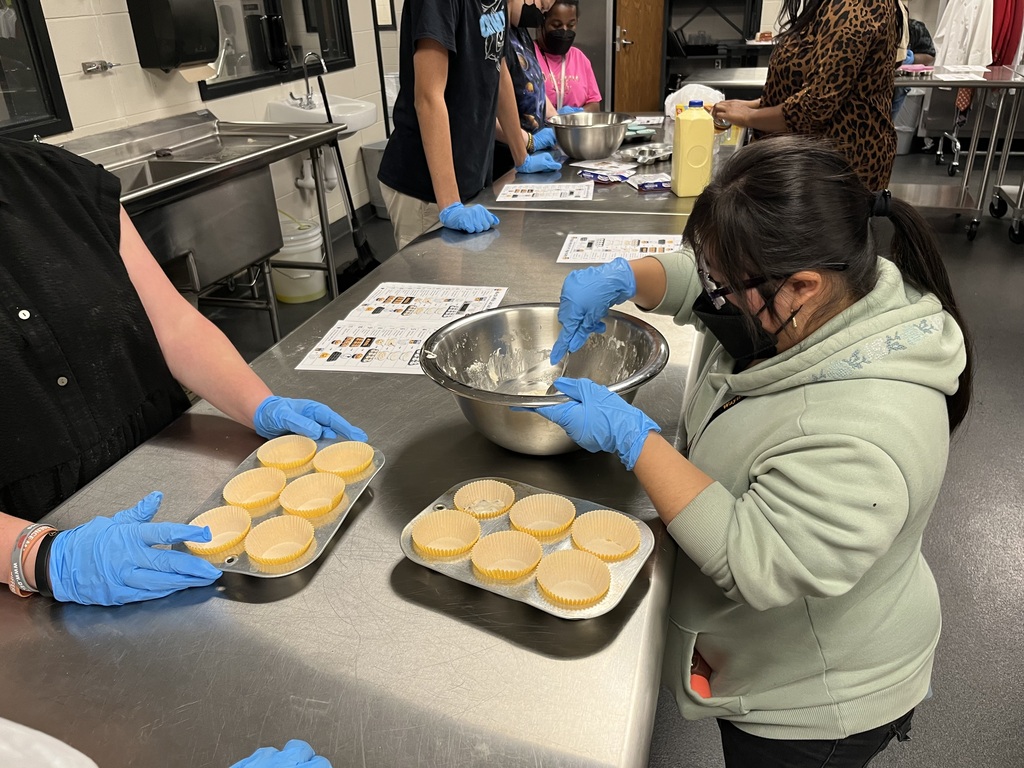 Image showing 🧁 BAKING UP SUCCESS IN DR. ROBINSON’S CLASS! 🐅🖤💛 Students in Dr. Robinson’s class have been busy building essential life and social skills through a tasty hands-on project! 👩🍳👨🍳 Our Tigers practiced reading and following a recipe step-by-step as they worked together to mix and bake homemade muffins. 🥣✨ Along the way, they put key communication skills into action by sharing materials, taking turns, and supporting one another as a team. And the best part? Enjoying the delicious results of their hard work! 😋🧁 Learning together, communicating together, and growing together with one shared purpose under One Roar! ⚡ Once a Tiger, always a Tiger! 🐅🐾 #OneRoar #ClaxtonTigers #LifeSkills #HandsOnLearning #TigerPride #OnceATigerAlwaysATiger #ClaxtonGA #CHSTigers