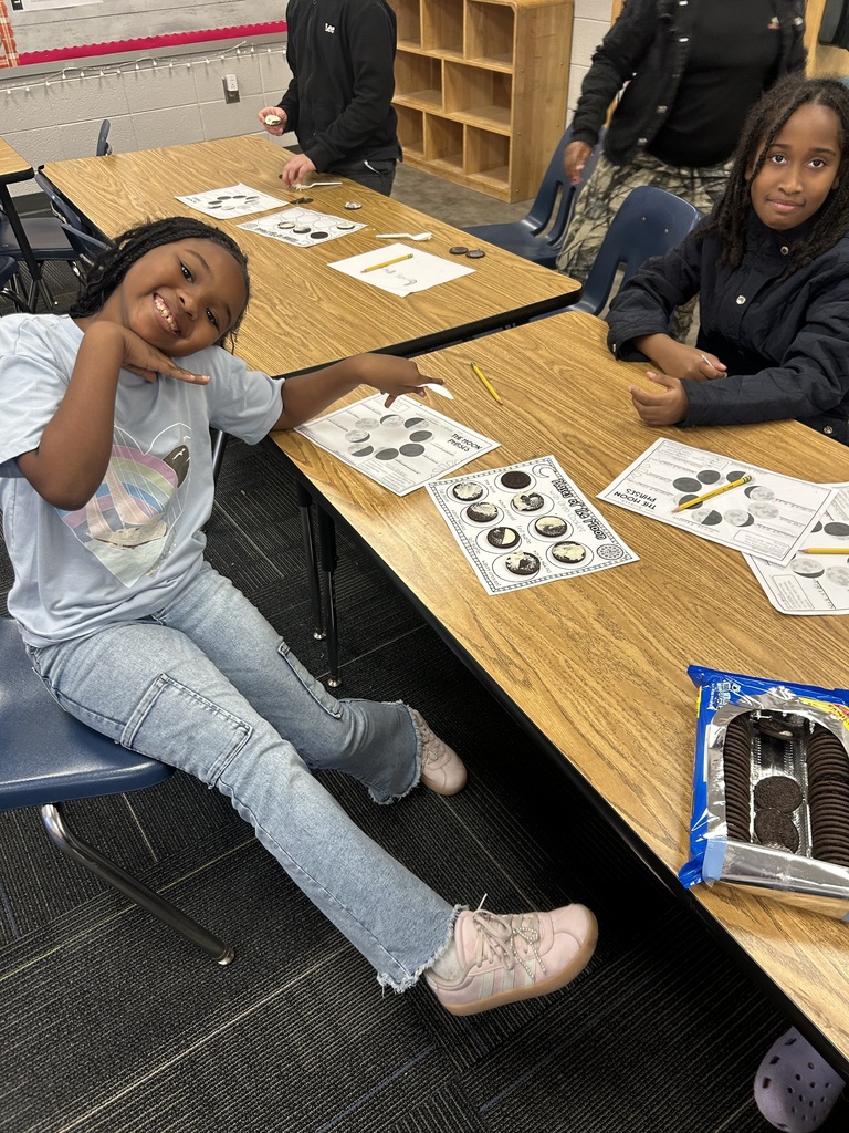 Students learning moon phases