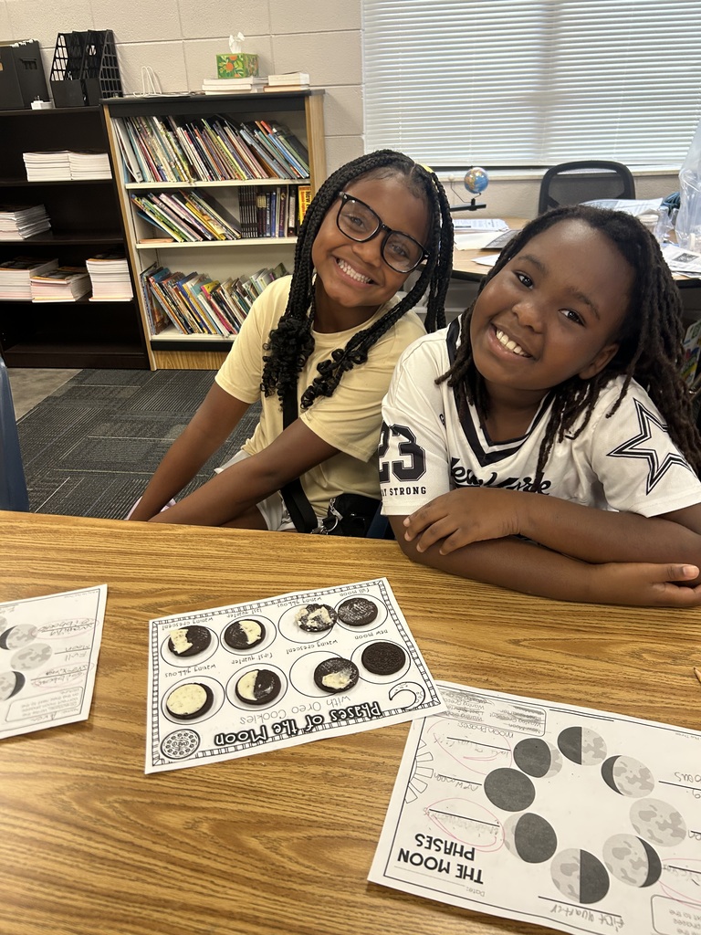 Students learning moon phases