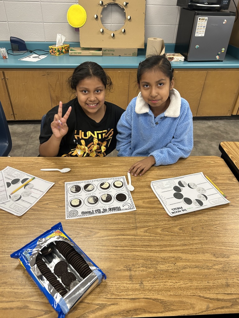 Students learning moon phases