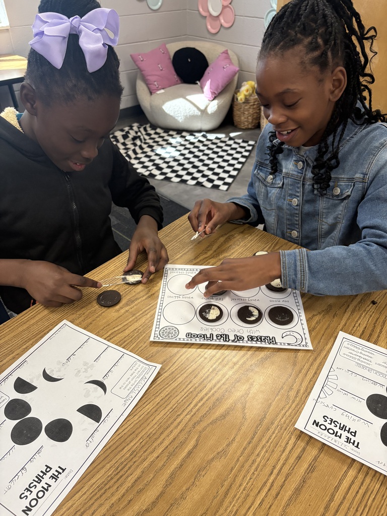 Students learning moon phases