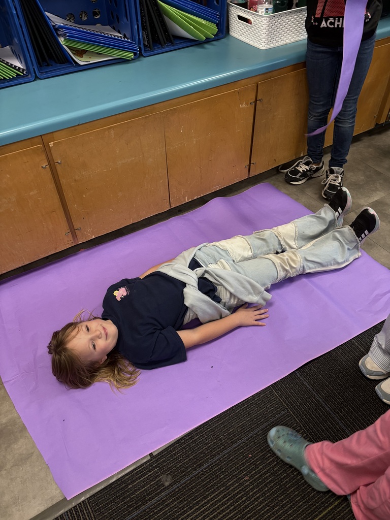 📏🐯 Measurement is getting REAL in 2nd grade! 🐯📏 Our second graders have been having a blast learning all about measurement! They’ve made their own rulers and put them to the test by measuring EVERYTHING from gummy worms—stretched and unstretched—to people! 😂📐 We were also lucky to have a very special guest reader, Mr. Paul Phillips, aka “Tall Paul,” join us to read How Big Is a Foot? 📚 He was the perfect person to help us put our measuring skills to work! After measuring Tall Paul, students measured themselves and then used their measurements to try to design and build a bed that would actually fit them! 🛏️📏 What a fun way to turn math into a hands-on learning experience! Way to go, 2nd grade! 💛🖤 #ClaxtonTigers #CESProud #SecondGrade #Measurement #HandsOnLearning #MathIsFun #PardonOurProgress #SuccessUnderConstruction