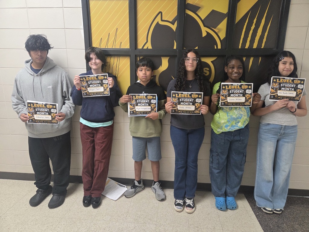 Left to right: Sebastian Lopez, Abigail Tippins, Miguel Dominguez-Camacho, Ariella Altman, Lauren McClain, and Elsa Yacuta-Cabrera. September Students of the Month at Claxton Middle School