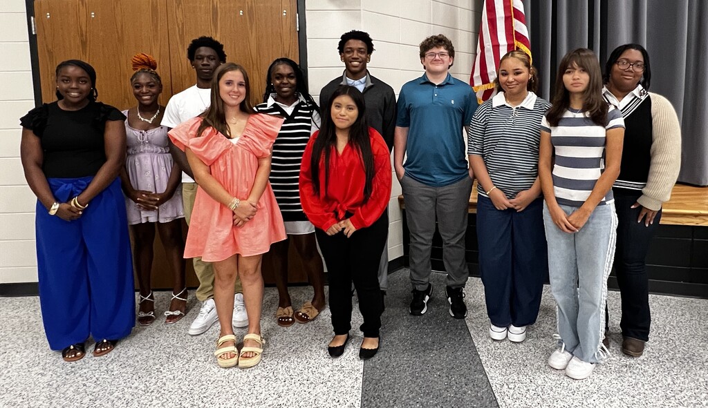 Image showing ⭐📜 CHS CELEBRATES NEW BETA OFFICERS AND MEMBERS! 🏆🐅🖤💛  On Wednesday, September 30, 2026, the Claxton High School Senior Beta Club officially held its Officer Installation and Fall New Member Induction Ceremony! 🌟  We are thrilled to announce that 27 new members were inducted into the CHS Senior Beta Club (11 freshmen, 6 sophomores, 6 juniors, and 4 seniors)! Thanks to this amazing growth, CHS Senior Beta Club has officially been named a 2026–2027 National Beta School of Merit! 🎓🏅  Meet Your 2026–2027 Senior Beta Officers:  🌟 President: Landon Crosby  🌟 Vice President: Shyanne Busbie  📝 Secretary: Irie Battle  💰 Treasurer: Rose Cajoux  📢 Reporter: Harmony Ryce  📸 Historian: Izabelle Gonzales  Welcome Our Newly Inducted Members:  💜 9th Grade: Jaylen Allen, Breyona Bacon, Hope Elan, Matthew Griffin, Citlalli Maldonado-Estrada, Allison Minis, Ka’Marianna Palmer, Harmony Ryce, T’Chylla Smith, Jakzenny Sosa-Martinez, & Zachery Valentine  💙 10th Grade: Irie Battle, Landon Crosby, Samuel Ikner, Michael LaSala, Joleen Ramos, & Garrison Sapp  ❤️ 11th Grade: Ayden Brewton, Brenae Cross, Anahi Dominguez, Anne-Saphir Fleurmont, Curtis Furman, Jr., & Naomi Morales-Perez  🩷 12th Grade: Gladys Dominguez-Flores, Leslie Garcia, Daniella Jussomme, & Ruthberlie Paul  Advisors Lavette Mikell, Lindsay Minis, and Layne Peacock look forward to guiding these outstanding Tigers as they excel academically and build leadership and networking skills through local, state, and national events! A big thank you to all the families who joined us to celebrate these incredible students! 👏✨  Leading by example, achieving excellence, and serving with one shared purpose under One Roar! 🐅🖤💛  Once a Tiger, always a Tiger! 🐅🐾  #OneRoar #ClaxtonTigers #CHSBeta #NationalBeta #SchoolOfMerit #StudentLeaders #AcademicExcellence #TigerPride #OnceATigerAlwaysATiger #ClaxtonGA