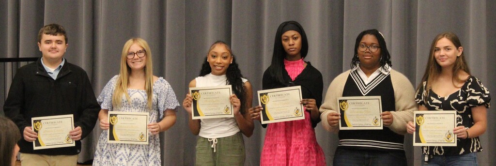 Image showing ⭐📜 CHS CELEBRATES NEW BETA OFFICERS AND MEMBERS! 🏆🐅🖤💛 On Wednesday, September 30, 2026, the Claxton High School Senior Beta Club officially held its Officer Installation and Fall New Member Induction Ceremony! 🌟 We are thrilled to announce that 27 new members were inducted into the CHS Senior Beta Club (11 freshmen, 6 sophomores, 6 juniors, and 4 seniors)! Thanks to this amazing growth, CHS Senior Beta Club has officially been named a 2026–2027 National Beta School of Merit! 🎓🏅 Meet Your 2026–2027 Senior Beta Officers: 🌟 President: Landon Crosby 🌟 Vice President: Shyanne Busbie 📝 Secretary: Irie Battle 💰 Treasurer: Rose Cajoux 📢 Reporter: Harmony Ryce 📸 Historian: Izabelle Gonzales Welcome Our Newly Inducted Members: 💜 9th Grade: Jaylen Allen, Breyona Bacon, Hope Elan, Matthew Griffin, Citlalli Maldonado-Estrada, Allison Minis, Ka’Marianna Palmer, Harmony Ryce, T’Chylla Smith, Jakzenny Sosa-Martinez, & Zachery Valentine 💙 10th Grade: Irie Battle, Landon Crosby, Samuel Ikner, Michael LaSala, Joleen Ramos, & Garrison Sapp ❤️ 11th Grade: Ayden Brewton, Brenae Cross, Anahi Dominguez, Anne-Saphir Fleurmont, Curtis Furman, Jr., & Naomi Morales-Perez 🩷 12th Grade: Gladys Dominguez-Flores, Leslie Garcia, Daniella Jussomme, & Ruthberlie Paul Advisors Lavette Mikell, Lindsay Minis, and Layne Peacock look forward to guiding these outstanding Tigers as they excel academically and build leadership and networking skills through local, state, and national events! A big thank you to all the families who joined us to celebrate these incredible students! 👏✨ Leading by example, achieving excellence, and serving with one shared purpose under One Roar! 🐅🖤💛 Once a Tiger, always a Tiger! 🐅🐾 #OneRoar #ClaxtonTigers #CHSBeta #NationalBeta #SchoolOfMerit #StudentLeaders #AcademicExcellence #TigerPride #OnceATigerAlwaysATiger #ClaxtonGA