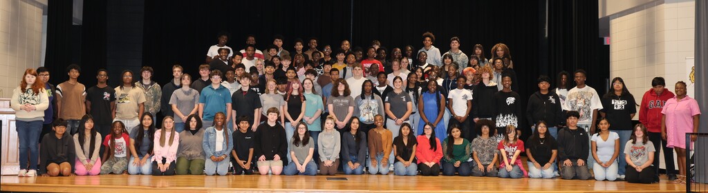 Image showing 🎓✨ CHS FRESHMEN COMMIT TO GRADUATING! CLASS OF 2030 TAKES THE PLEDGE! 🖤💛🐅 On Friday, October 2, 2026, our Claxton High School 9th graders took a monumental step in their high school journey during the annual 9th Grade Commitment Ceremony! Surrounded by families, faculty, and supporters, the Class of 2030 officially pledged to put in the work required to cross the stage and graduate on time in May 2030! 📜🎓 The morning opened with a warm welcome from CHS Principal James Rowe, followed by CHS Counselor Pamela Calloway introducing guest speaker and CHS alumnus Robbie Lane (Class of 2022)! 🎙️🌟 Robbie delivered an inspiring message, sharing 5 key points for achieving success in school and in life: 1️⃣ Set goals and chase goals 🎯 2️⃣ Be a great friend and make great friends 🤝 3️⃣ Build a strong work ethic 💪 4️⃣ Never let anyone tell you that you can't 🚫🛑 5️⃣ Find your purpose ✨ To seal their commitment, students signed a graduation gown, enjoyed refreshments with their families, and took a full class photo to mark this special milestone! 📸🥳 We are so proud of our Class of 2030 and can’t wait to support them every step of the way as they strive with one shared purpose under One Roar! ⚡ Once a Tiger, always a Tiger! 🐅🐾 #OneRoar #ClaxtonTigers #ClassOf2030 #CommitmentCeremony #GraduationBound #FreshmanYear #TigerPride #OnceATigerAlwaysATiger #ClaxtonGA #CHSTigers