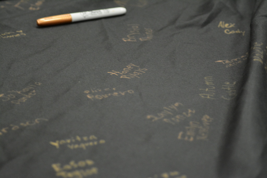 Image showing 🎓✨ CHS FRESHMEN COMMIT TO GRADUATING! CLASS OF 2030 TAKES THE PLEDGE! 🖤💛🐅  On Friday, October 2, 2026, our Claxton High School 9th graders took a monumental step in their high school journey during the annual 9th Grade Commitment Ceremony! Surrounded by families, faculty, and supporters, the Class of 2030 officially pledged to put in the work required to cross the stage and graduate on time in May 2030! 📜🎓  The morning opened with a warm welcome from CHS Principal James Rowe, followed by CHS Counselor Pamela Calloway introducing guest speaker and CHS alumnus Robbie Lane (Class of 2022)! 🎙️🌟  Robbie delivered an inspiring message, sharing 5 key points for achieving success in school and in life: 1️⃣ Set goals and chase goals 🎯 2️⃣ Be a great friend and make great friends 🤝 3️⃣ Build a strong work ethic 💪 4️⃣ Never let anyone tell you that you can't 🚫🛑 5️⃣ Find your purpose ✨  To seal their commitment, students signed a graduation gown, enjoyed refreshments with their families, and took a full class photo to mark this special milestone! 📸🥳  We are so proud of our Class of 2030 and can’t wait to support them every step of the way as they strive with one shared purpose under One Roar! ⚡  Once a Tiger, always a Tiger! 🐅🐾  #OneRoar #ClaxtonTigers #ClassOf2030 #CommitmentCeremony #GraduationBound #FreshmanYear #TigerPride #OnceATigerAlwaysATiger #ClaxtonGA #CHSTigers