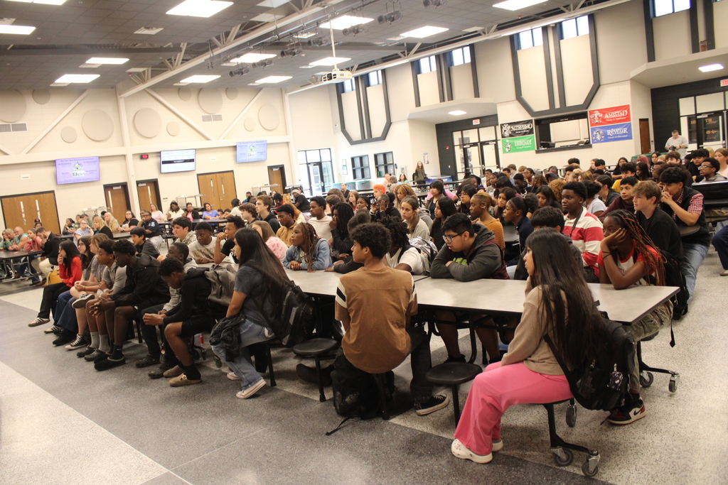 Image showing 🎓✨ CHS FRESHMEN COMMIT TO GRADUATING! CLASS OF 2030 TAKES THE PLEDGE! 🖤💛🐅  On Friday, October 2, 2026, our Claxton High School 9th graders took a monumental step in their high school journey during the annual 9th Grade Commitment Ceremony! Surrounded by families, faculty, and supporters, the Class of 2030 officially pledged to put in the work required to cross the stage and graduate on time in May 2030! 📜🎓  The morning opened with a warm welcome from CHS Principal James Rowe, followed by CHS Counselor Pamela Calloway introducing guest speaker and CHS alumnus Robbie Lane (Class of 2022)! 🎙️🌟  Robbie delivered an inspiring message, sharing 5 key points for achieving success in school and in life: 1️⃣ Set goals and chase goals 🎯 2️⃣ Be a great friend and make great friends 🤝 3️⃣ Build a strong work ethic 💪 4️⃣ Never let anyone tell you that you can't 🚫🛑 5️⃣ Find your purpose ✨  To seal their commitment, students signed a graduation gown, enjoyed refreshments with their families, and took a full class photo to mark this special milestone! 📸🥳  We are so proud of our Class of 2030 and can’t wait to support them every step of the way as they strive with one shared purpose under One Roar! ⚡  Once a Tiger, always a Tiger! 🐅🐾  #OneRoar #ClaxtonTigers #ClassOf2030 #CommitmentCeremony #GraduationBound #FreshmanYear #TigerPride #OnceATigerAlwaysATiger #ClaxtonGA #CHSTigers