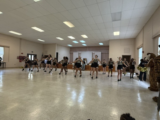 Image showing 📣📣 SPREADING HOMECOMING SPIRIT TO OUR LITTLEST TIGERS! 📣🐅🖤💛 On Tuesday, October 6, 2026, our amazing CHS Cheerleaders brought the energy, smiles, and Tiger Pride to Evans County Headstart for a special Homecoming Pep Rally! 🎉✨ Our cheer team helped the Headstart children get pumped up for Homecoming Week, teaching them cheers, showing off some moves, and making sure our future Tigers felt right in the middle of the celebration! 📣🐾 Building community, sharing joy, and inspiring the next generation as we roar together with one shared purpose under One Roar! ⚡ Once a Tiger, always a Tiger! 🐅🐾 #OneRoar #ClaxtonTigers #CHSHomecoming #Homecoming2026 #CHSCheer #FutureTigers #EvansCountyHeadstart #TigerPride #OnceATigerAlwaysATiger #ClaxtonGA #CHSTigers