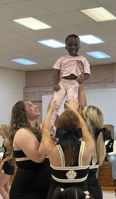Image showing 📣📣 SPREADING HOMECOMING SPIRIT TO OUR LITTLEST TIGERS! 📣🐅🖤💛 On Tuesday, October 6, 2026, our amazing CHS Cheerleaders brought the energy, smiles, and Tiger Pride to Evans County Headstart for a special Homecoming Pep Rally! 🎉✨ Our cheer team helped the Headstart children get pumped up for Homecoming Week, teaching them cheers, showing off some moves, and making sure our future Tigers felt right in the middle of the celebration! 📣🐾 Building community, sharing joy, and inspiring the next generation as we roar together with one shared purpose under One Roar! ⚡ Once a Tiger, always a Tiger! 🐅🐾 #OneRoar #ClaxtonTigers #CHSHomecoming #Homecoming2026 #CHSCheer #FutureTigers #EvansCountyHeadstart #TigerPride #OnceATigerAlwaysATiger #ClaxtonGA #CHSTigers