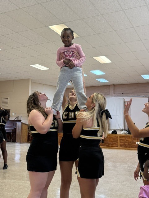 Image showing 📣📣 SPREADING HOMECOMING SPIRIT TO OUR LITTLEST TIGERS! 📣🐅🖤💛 On Tuesday, October 6, 2026, our amazing CHS Cheerleaders brought the energy, smiles, and Tiger Pride to Evans County Headstart for a special Homecoming Pep Rally! 🎉✨ Our cheer team helped the Headstart children get pumped up for Homecoming Week, teaching them cheers, showing off some moves, and making sure our future Tigers felt right in the middle of the celebration! 📣🐾 Building community, sharing joy, and inspiring the next generation as we roar together with one shared purpose under One Roar! ⚡ Once a Tiger, always a Tiger! 🐅🐾 #OneRoar #ClaxtonTigers #CHSHomecoming #Homecoming2026 #CHSCheer #FutureTigers #EvansCountyHeadstart #TigerPride #OnceATigerAlwaysATiger #ClaxtonGA #CHSTigers