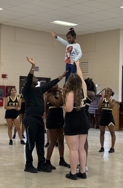 Image showing 📣📣 SPREADING HOMECOMING SPIRIT TO OUR LITTLEST TIGERS! 📣🐅🖤💛 On Tuesday, October 6, 2026, our amazing CHS Cheerleaders brought the energy, smiles, and Tiger Pride to Evans County Headstart for a special Homecoming Pep Rally! 🎉✨ Our cheer team helped the Headstart children get pumped up for Homecoming Week, teaching them cheers, showing off some moves, and making sure our future Tigers felt right in the middle of the celebration! 📣🐾 Building community, sharing joy, and inspiring the next generation as we roar together with one shared purpose under One Roar! ⚡ Once a Tiger, always a Tiger! 🐅🐾 #OneRoar #ClaxtonTigers #CHSHomecoming #Homecoming2026 #CHSCheer #FutureTigers #EvansCountyHeadstart #TigerPride #OnceATigerAlwaysATiger #ClaxtonGA #CHSTigers