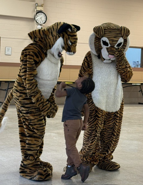 Image showing 📣📣 SPREADING HOMECOMING SPIRIT TO OUR LITTLEST TIGERS! 📣🐅🖤💛 On Tuesday, October 6, 2026, our amazing CHS Cheerleaders brought the energy, smiles, and Tiger Pride to Evans County Headstart for a special Homecoming Pep Rally! 🎉✨ Our cheer team helped the Headstart children get pumped up for Homecoming Week, teaching them cheers, showing off some moves, and making sure our future Tigers felt right in the middle of the celebration! 📣🐾 Building community, sharing joy, and inspiring the next generation as we roar together with one shared purpose under One Roar! ⚡ Once a Tiger, always a Tiger! 🐅🐾 #OneRoar #ClaxtonTigers #CHSHomecoming #Homecoming2026 #CHSCheer #FutureTigers #EvansCountyHeadstart #TigerPride #OnceATigerAlwaysATiger #ClaxtonGA #CHSTigers