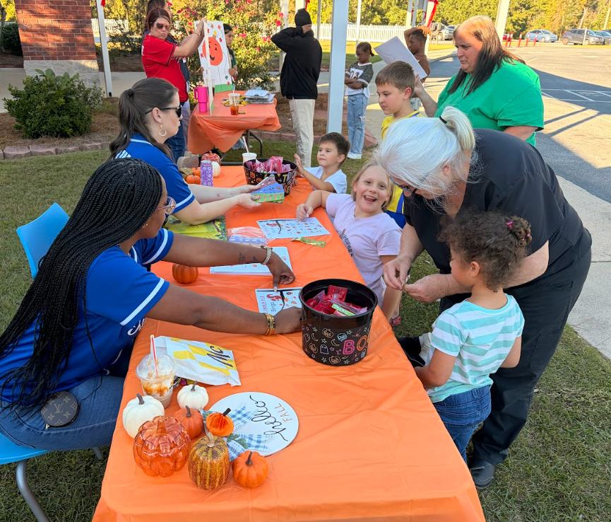 📚🍂 What a wonderful evening at Claxton Elementary School! Our students and families enjoyed Literacy Night yesterday afternoon, filled with fun activities inspired by books, sweet treats, and FREE books to take home! ❤️ Thank you to everyone who came out to celebrate reading and make literacy a fun experience for our CES Tigers. We love seeing our school community come together to build a love of reading! 🐯📖 #ClaxtonTigers #CESProud #PardonOurProgress #SuccessUnderConstruction