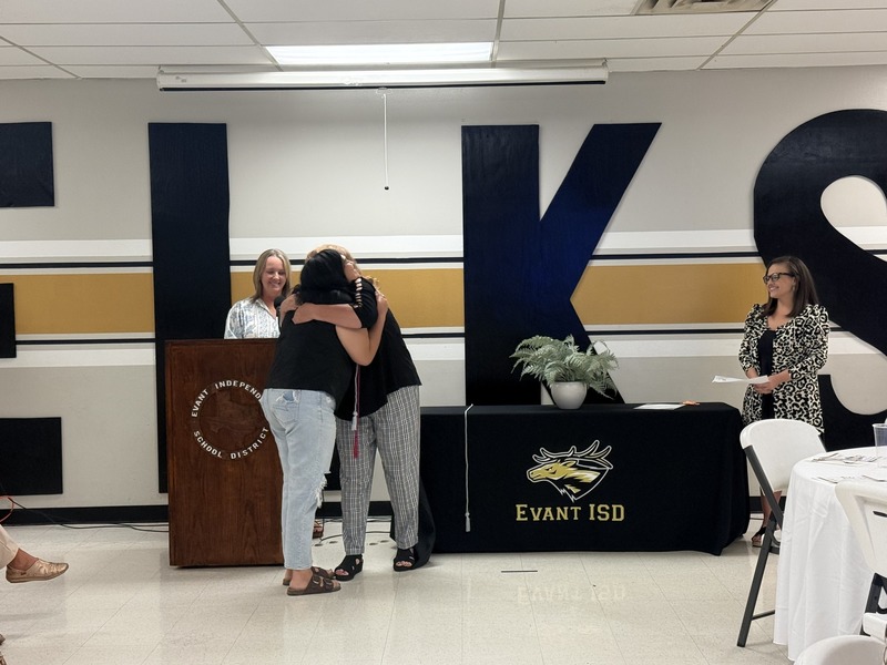 Marisol A receiving her cord, image