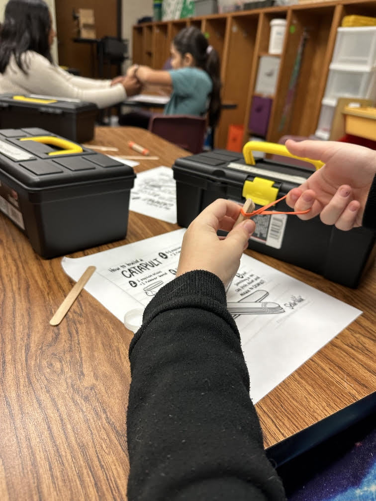 Hommel's Construction Club discussed force and motion as well as other concepts of physics as they built catapults!