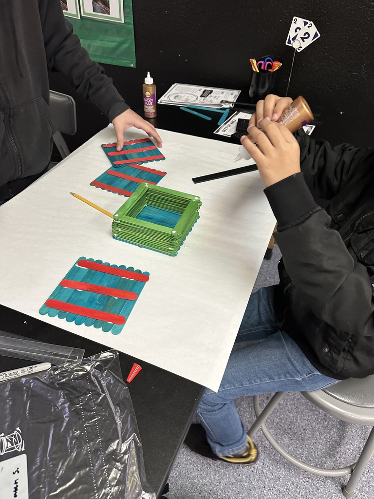 Engineering club designing and building Birdhouses!