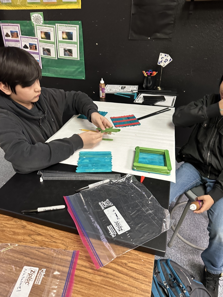 Engineering club designing and building Birdhouses!