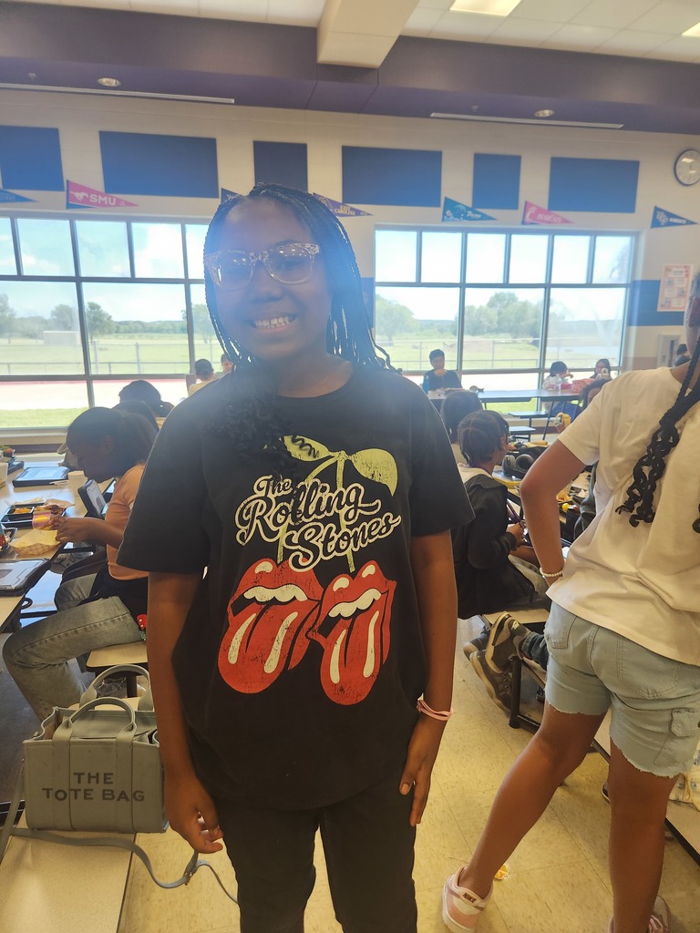 Staff and students showcasing thier favorite tshirt!!