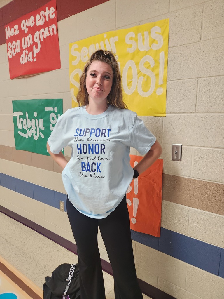 Staff and students showcasing thier favorite tshirt!!