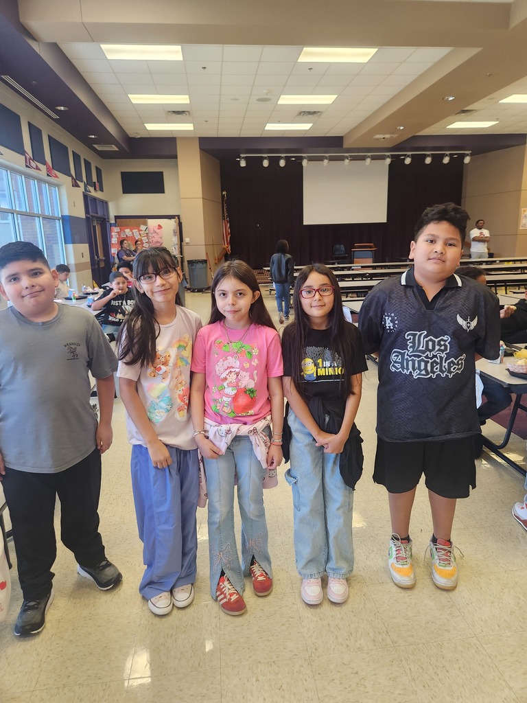 Staff and students showcasing thier favorite tshirt!!
