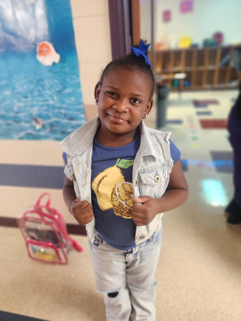 Staff and students showcasing thier favorite tshirt!!
