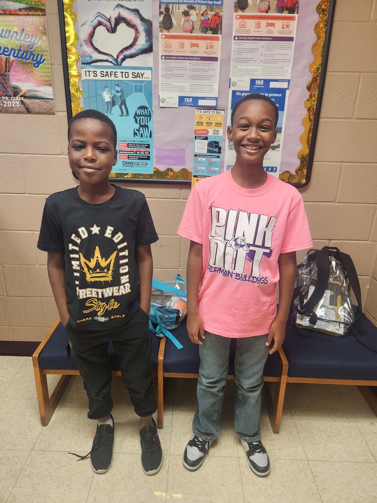 Staff and students showcasing thier favorite tshirt!!