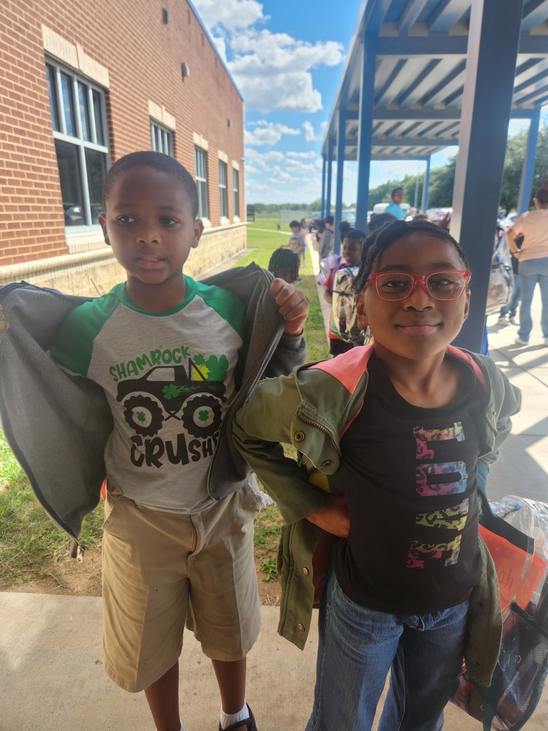 Staff and students showcasing thier favorite tshirt!!