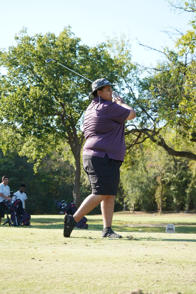 Everman Golf Team takes a swing at the tournament.