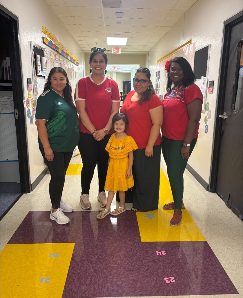 teachers and student posing