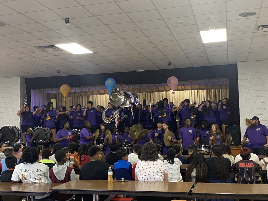 Band members playing a song.