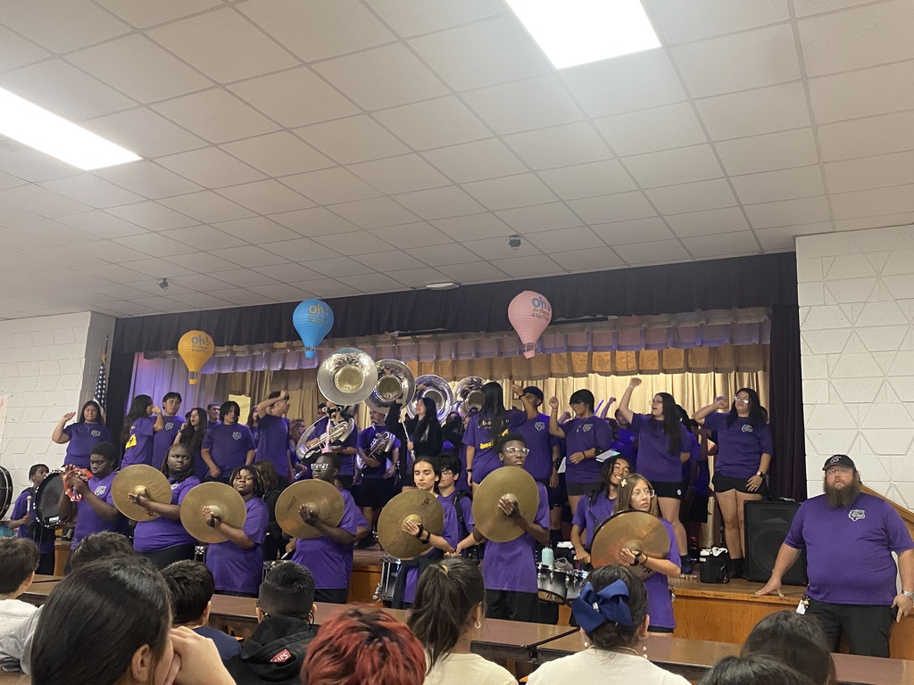 Band members playing a song.