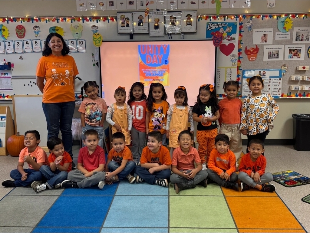 students dressed in orange