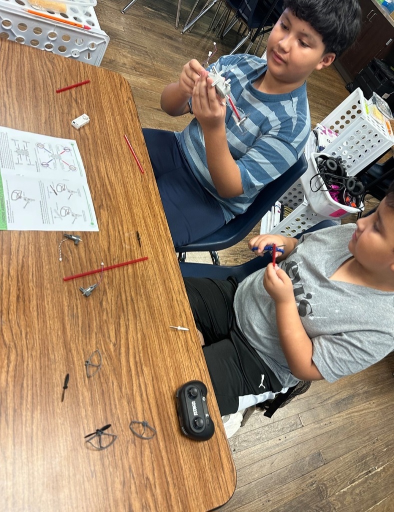 Hommel Robotics Club building robot art and flying drones