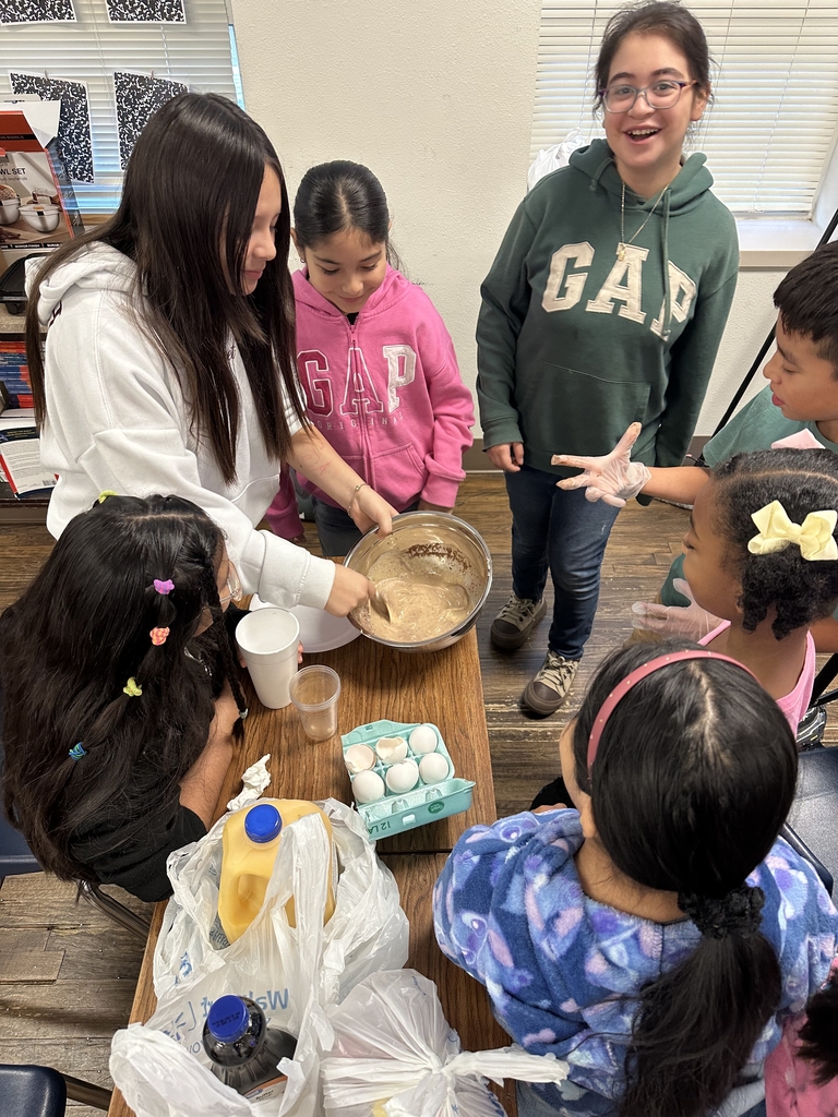 Cooking club making french toast! yum 