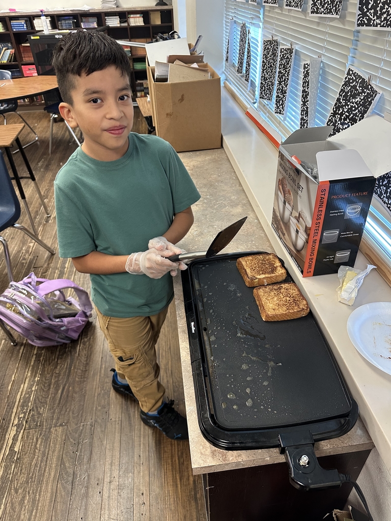 Cooking club making french toast! yum 