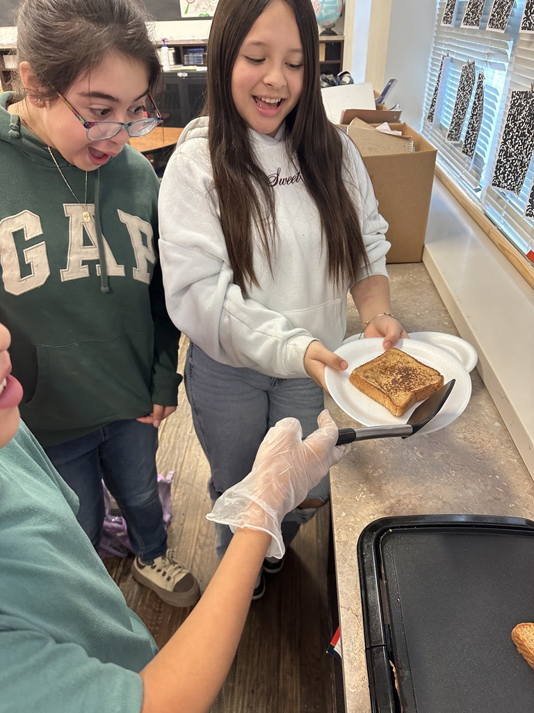 Cooking club making french toast! yum 