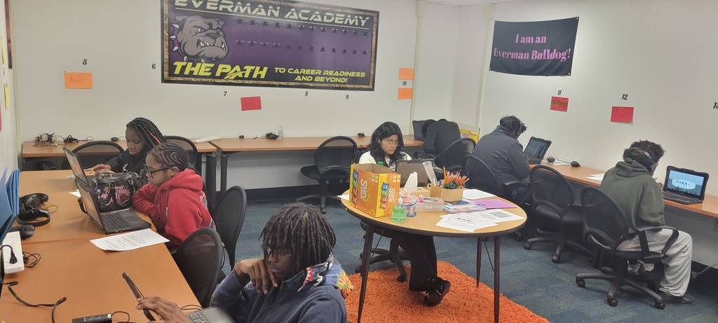 Students engaged in learning. Working on chromebooks to complete their individual course assignments.