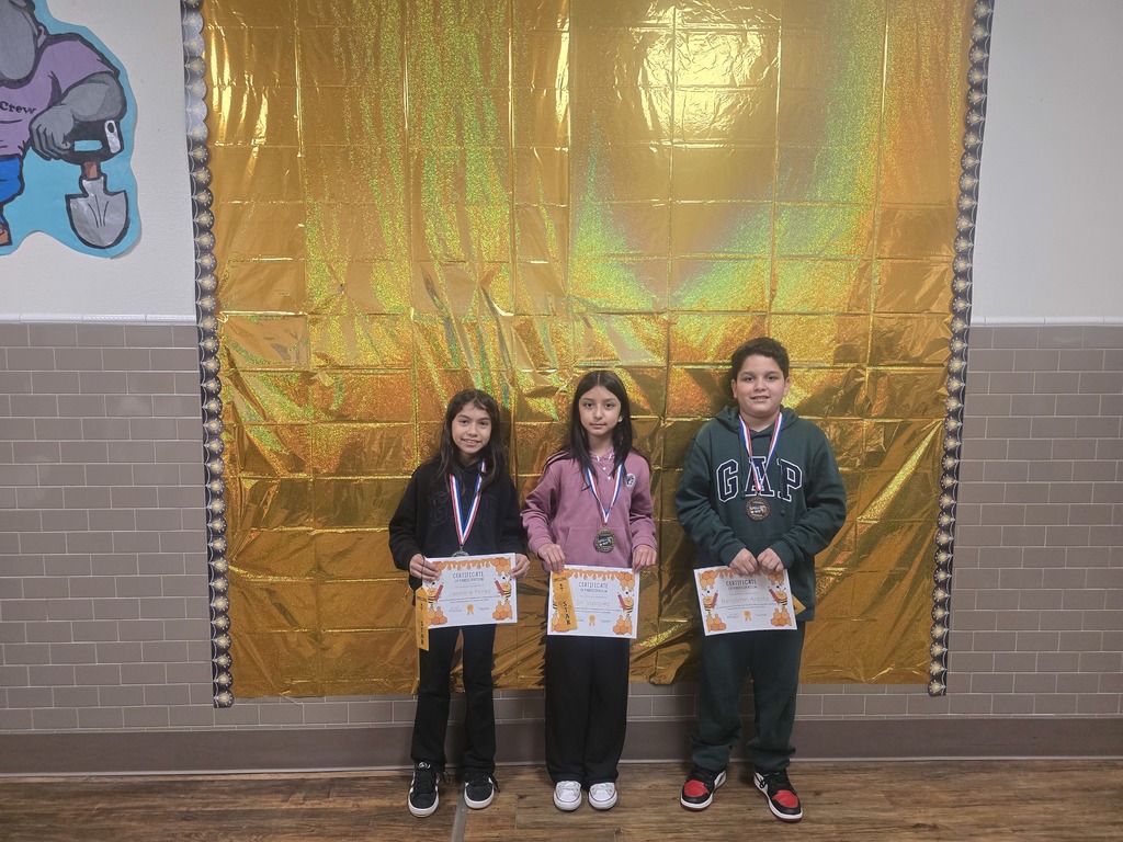 Spelling Bee winner 2nd place Jasmine, 1st place Sol, and 3rd Place Benjamin