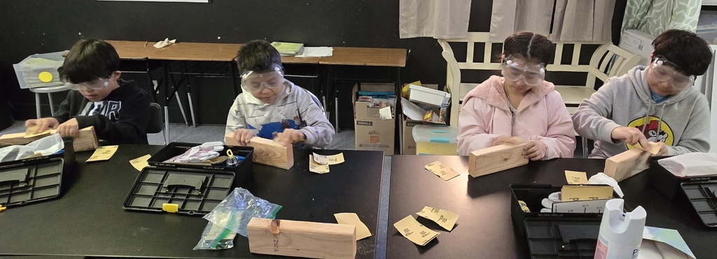 Hommel construction club reviewed the concepts of friction and grit for sanding, the reason we measure twice, and the amount of force needed to sink a nail. 