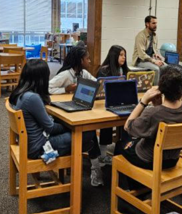 Counselor Hinkle meeting with students